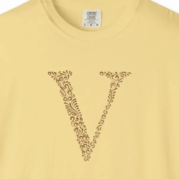 initial-v-tee-butter-chest Close-up of the Initial V print on a Butter Comfort Colors 1717 tee