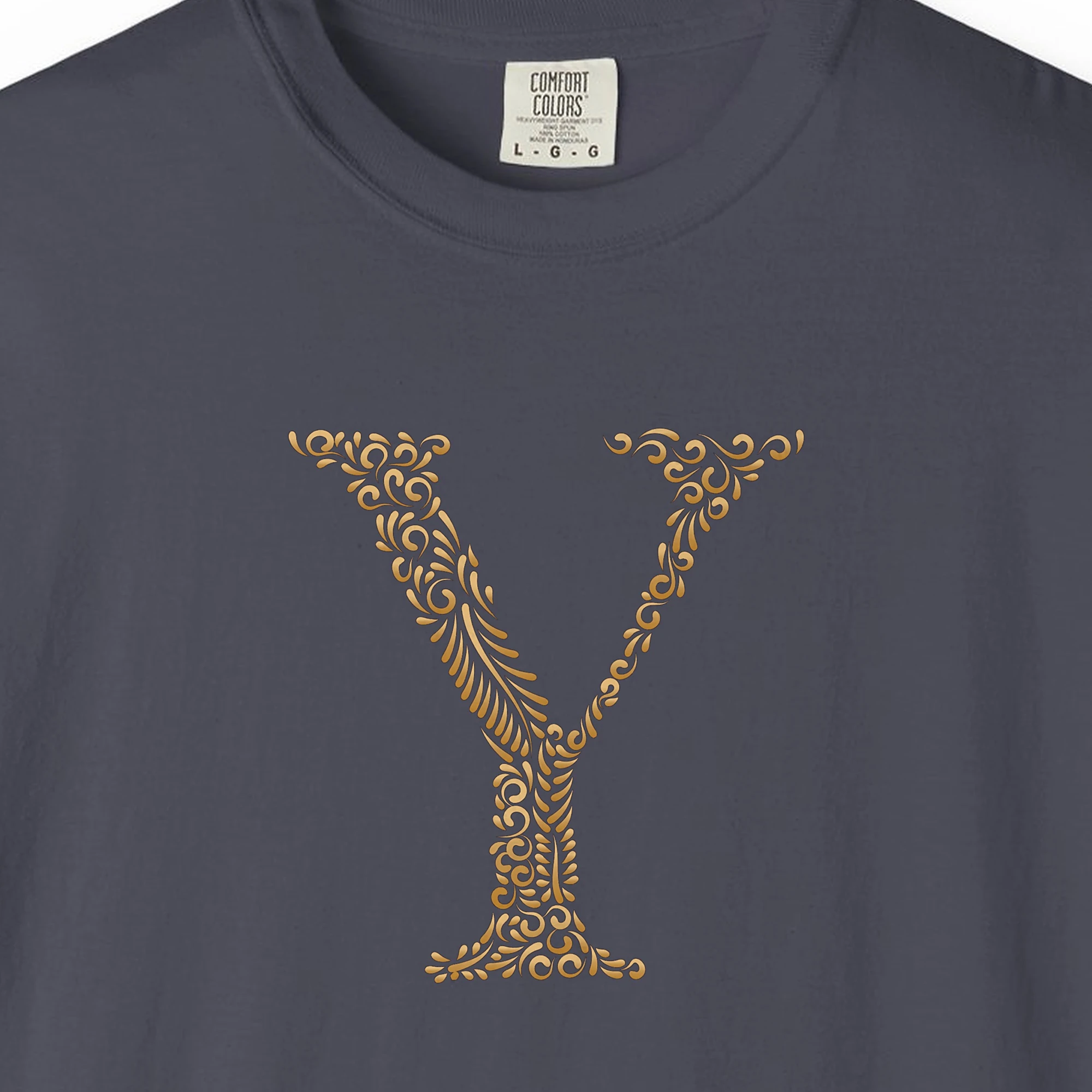 Close-up of the Initial Y print on a Navy Comfort Colors 1717 tee