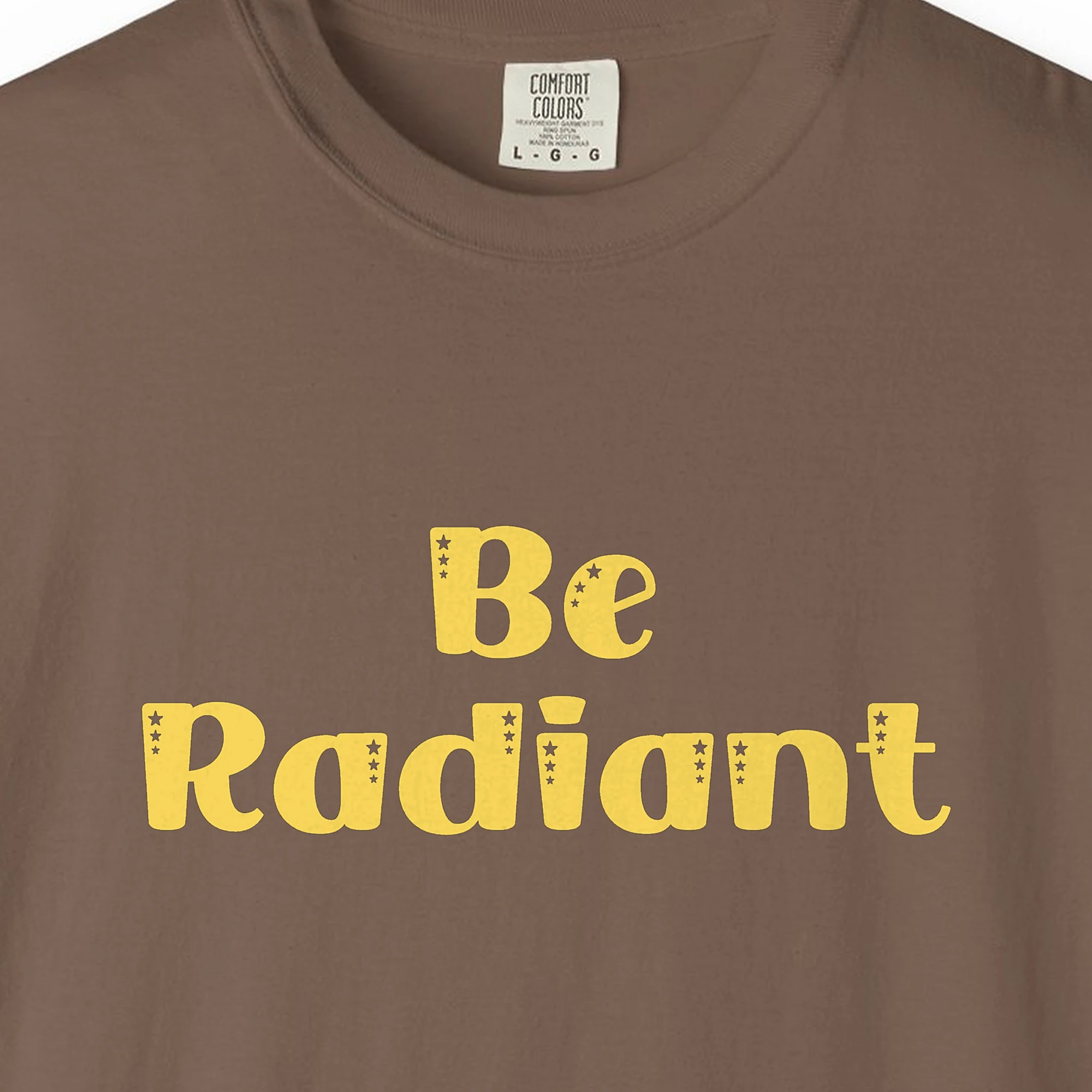 Close-up of the Inner Radiance print on a Espresso Comfort Colors 1717 tee