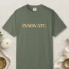 Innovate design on a Moss Comfort Colors 1717 tee, laid flat