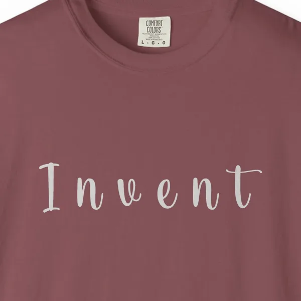 invent-slab-serif-tee-brick-chest Close-up of the Invent Slab Serif print on a Brick Comfort Colors 1717 tee