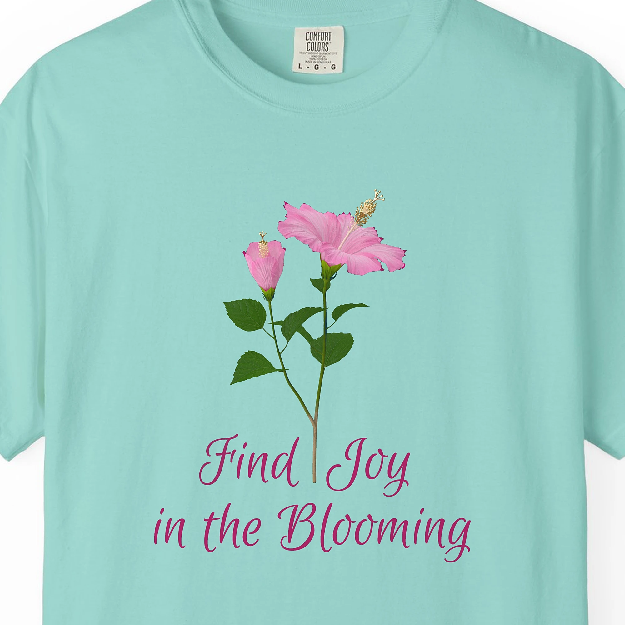 Close-up of the Joy in the Blooming print on a Chalky Mint Comfort Colors 1717 tee