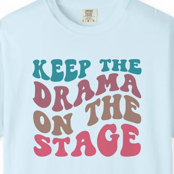 Close-up of the Keep the Drama on the Stage print on a Chambray Comfort Colors 1717 tee