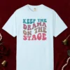 Keep the Drama on the Stage design on a Chambray Comfort Colors 1717 tee, laid flat