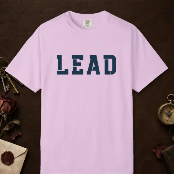 lead-tee-orchid-front Lead design on a Orchid Comfort Colors 1717 tee, laid flat