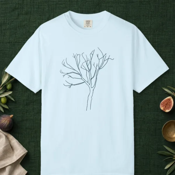 Leaning Bare Tree design on a Chambray Comfort Colors 1717 tee, laid flat