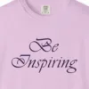 Close-up of the Light for Others print on a Orchid Comfort Colors 1717 tee