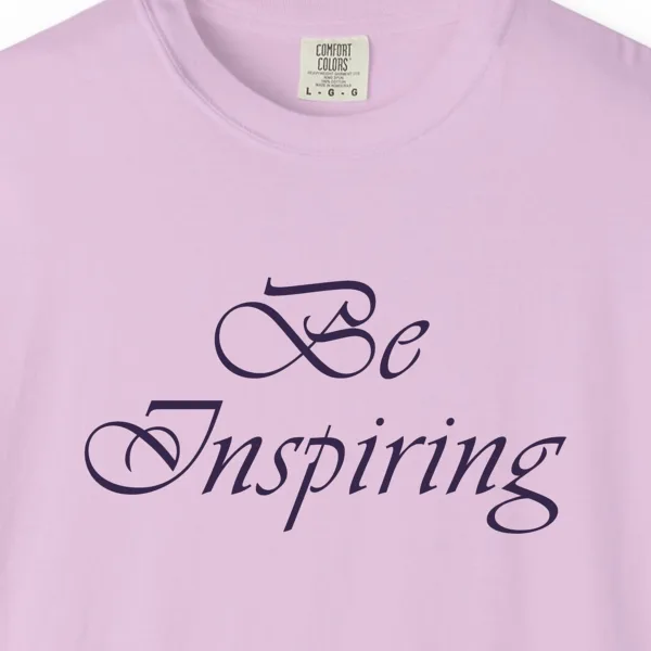 Close-up of the Light for Others print on a Orchid Comfort Colors 1717 tee