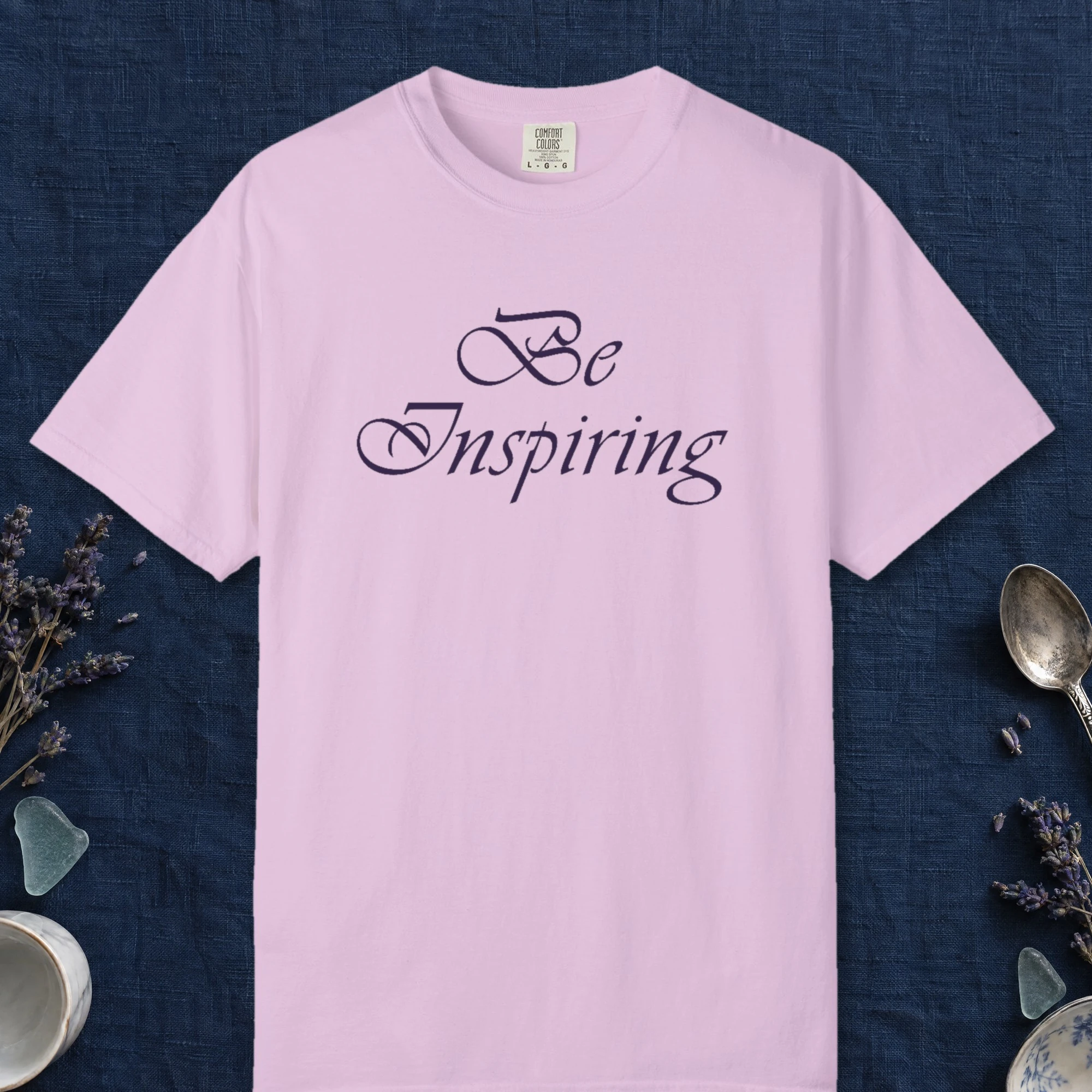 Light for Others design on a Orchid Comfort Colors 1717 tee, laid flat