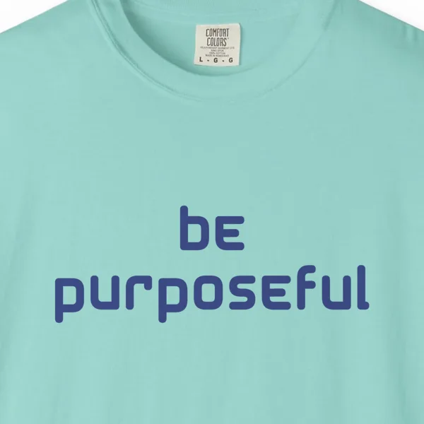 living-with-purpose-tee-chalky-mint-chest Close-up of the Living with Purpose print on a Chalky Mint Comfort Colors 1717 tee