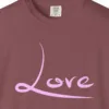 Close-up of the Love print on a Brick Comfort Colors 1717 tee