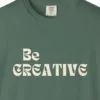 made-to-create-tee-blue-spruce-chest Close-up of the Made to Create print on a Blue Spruce Comfort Colors 1717 tee