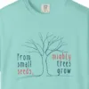 Close-up of the Mighty Trees Grow print on a Chalky Mint Comfort Colors 1717 tee