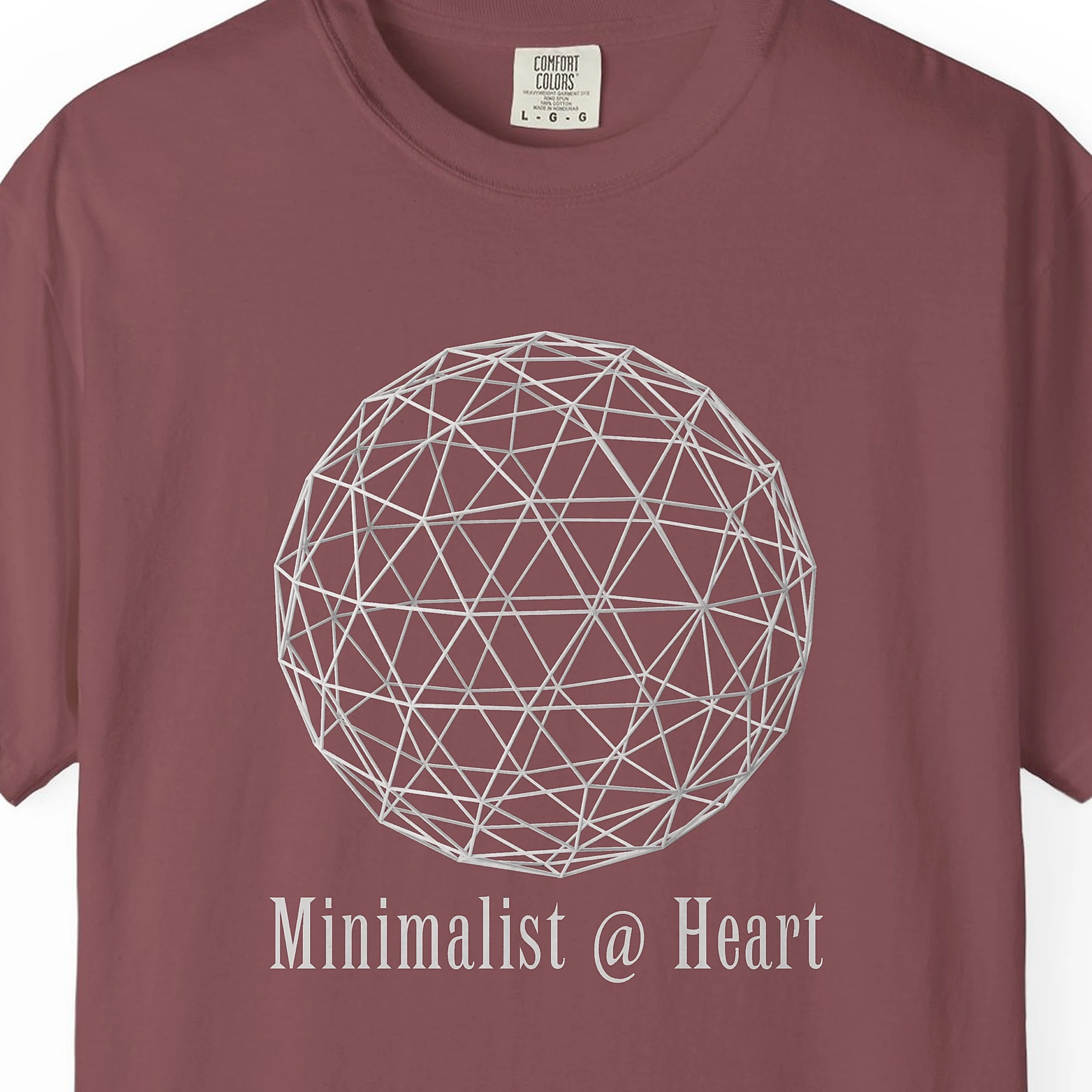 minimalist-at-heart-tee-brick-chest Close-up of the Minimalist at Heart print on a Brick Comfort Colors 1717 tee