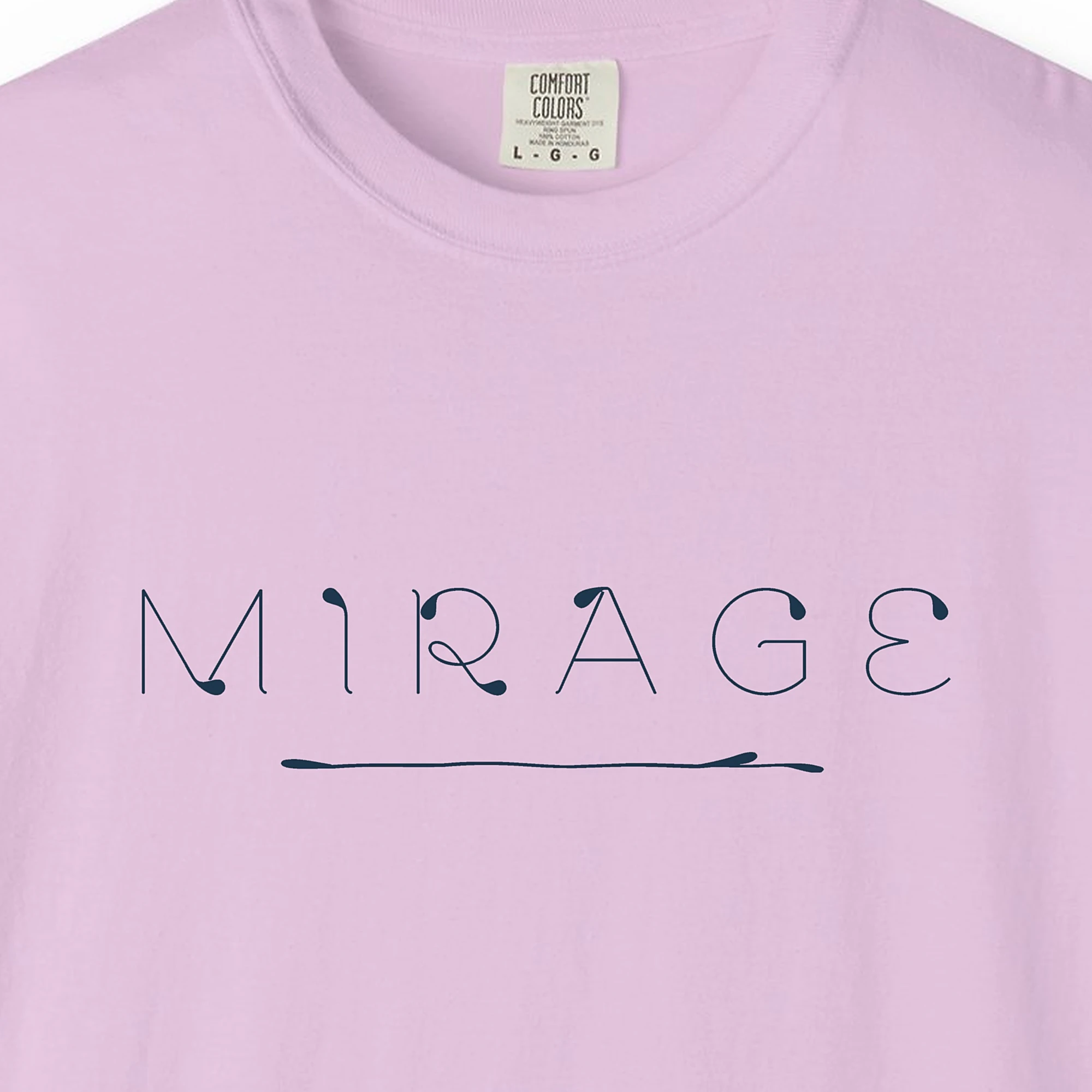 Close-up of the Mirage Hairline print on a Orchid Comfort Colors 1717 tee