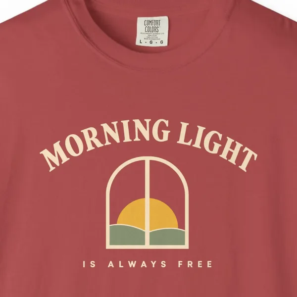 morning-light-is-always-free-tee-crimson-chest Close-up of the Morning Light Is Always Free print on a Crimson Comfort Colors 1717 tee