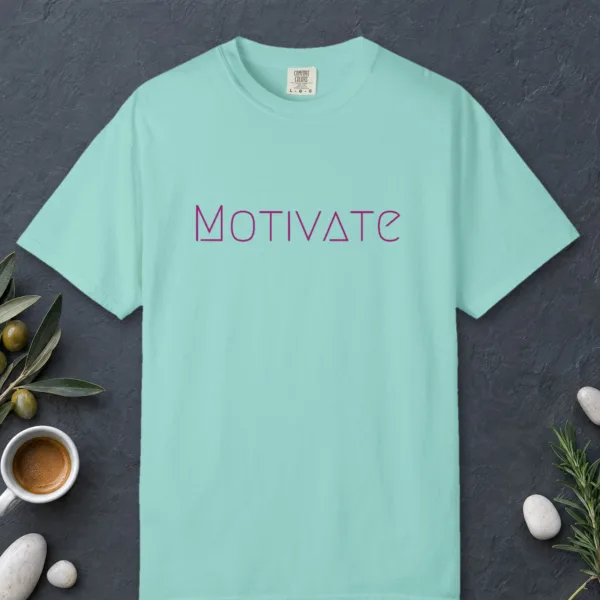 Motivate design on a Chalky Mint Comfort Colors 1717 tee, laid flat