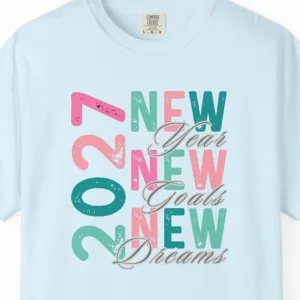 Close-up of the New Goals New Dreams print on a Chambray Comfort Colors 1717 tee
