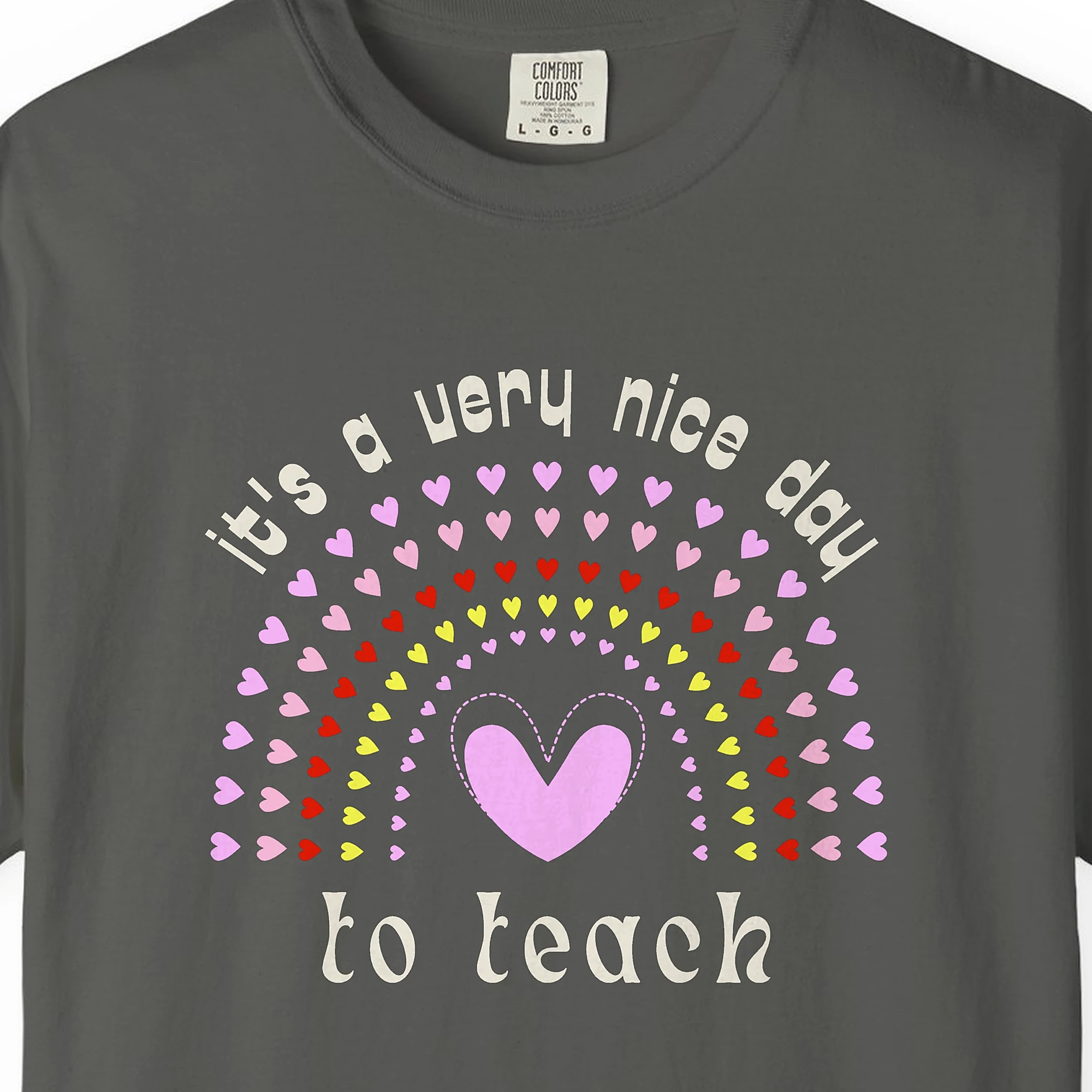 Close-up of the Nice Day to Teach print on a Pepper Comfort Colors 1717 tee