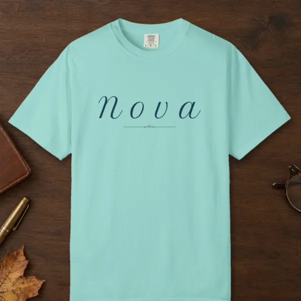Nova Italic design on a Chalky Mint Comfort Colors 1717 tee, laid flat