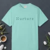 Nurture Flared Serif design on a Chalky Mint Comfort Colors 1717 tee, laid flat