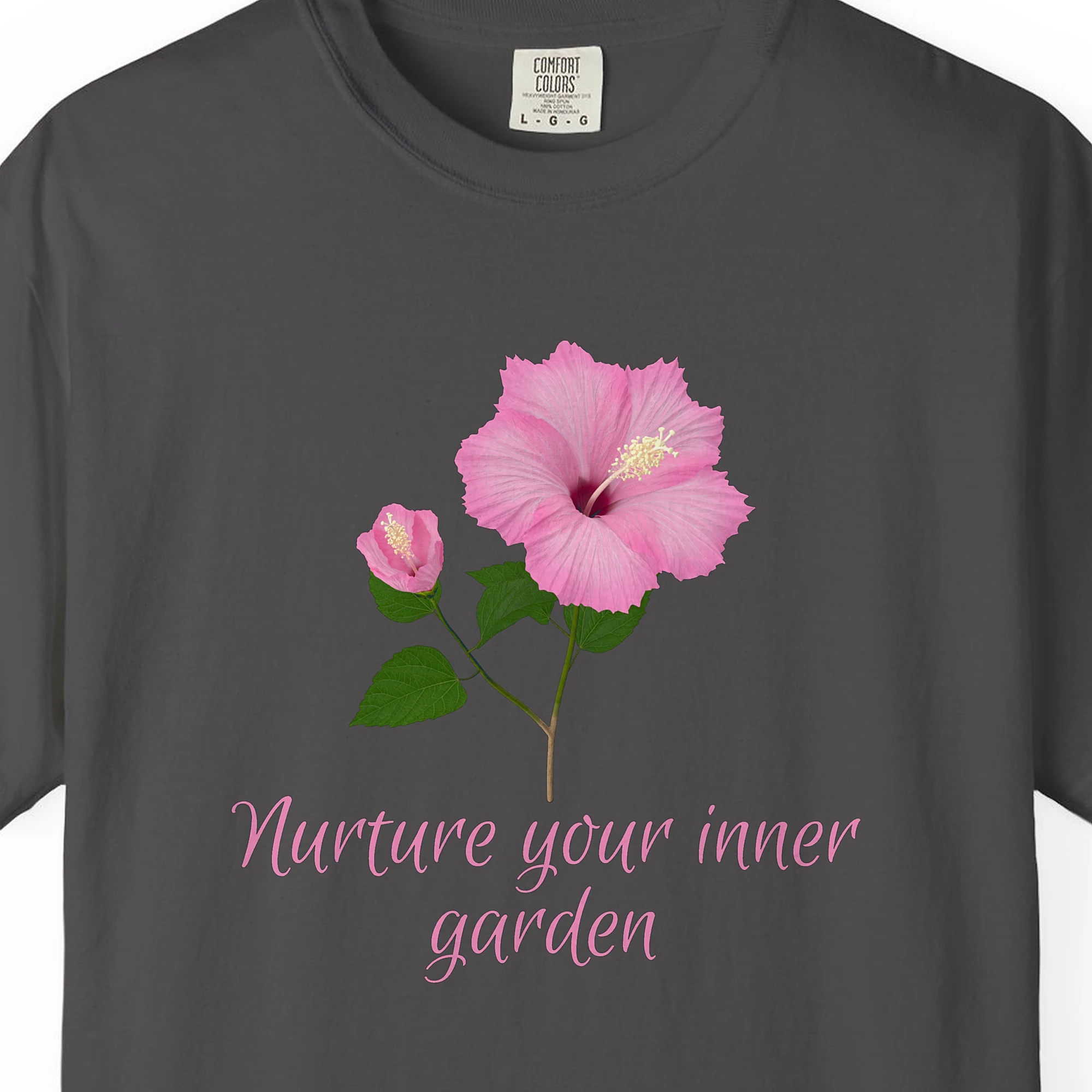 Close-up of the Nurture Your Inner Garden print on a Graphite Comfort Colors 1717 tee