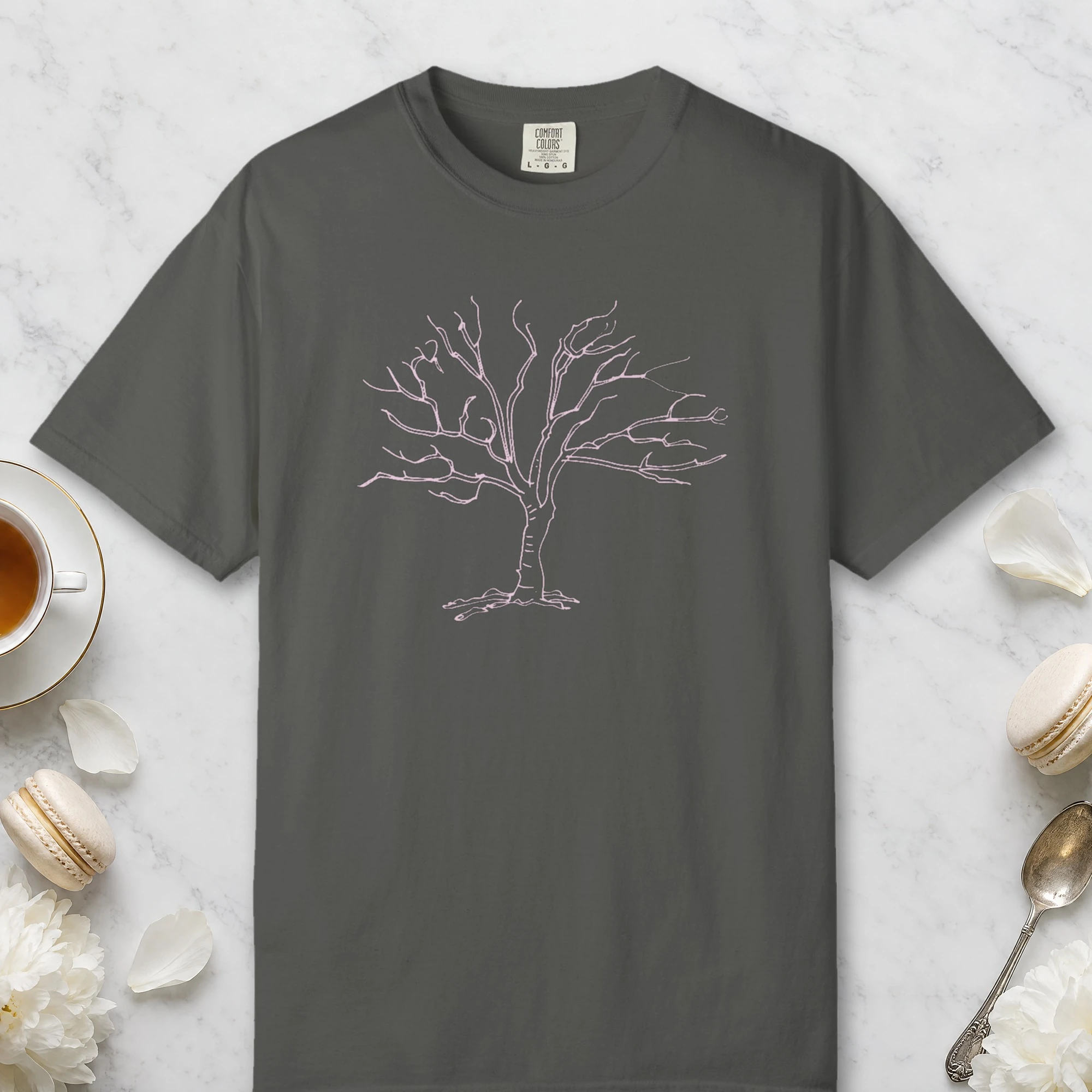 Old Gnarled Tree design on a Pepper Comfort Colors 1717 tee, laid flat