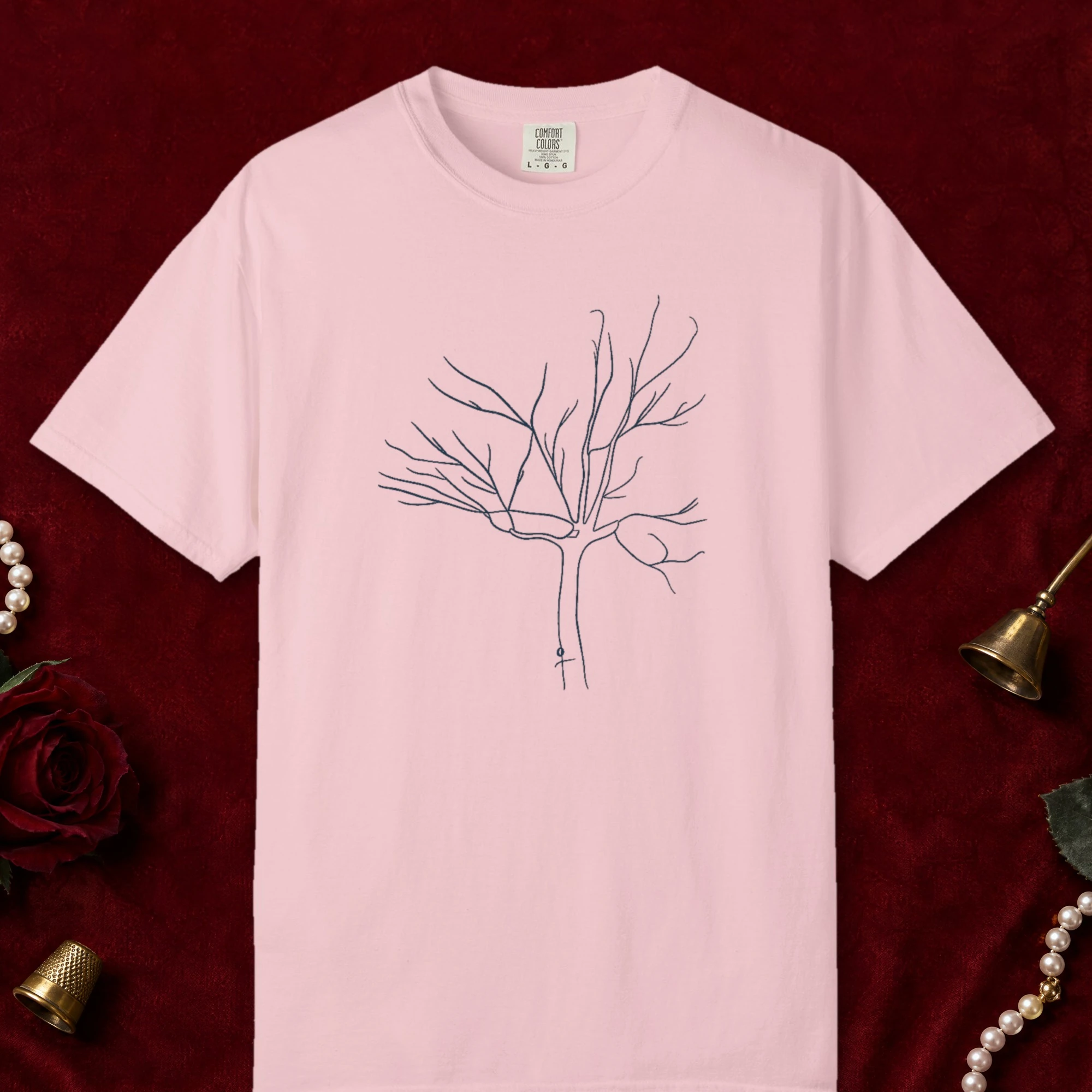 Open Branches design on a Blossom Comfort Colors 1717 tee, laid flat
