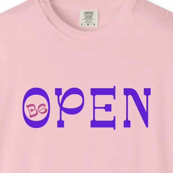 Close-up of the Open to Wonder print on a Blossom Comfort Colors 1717 tee