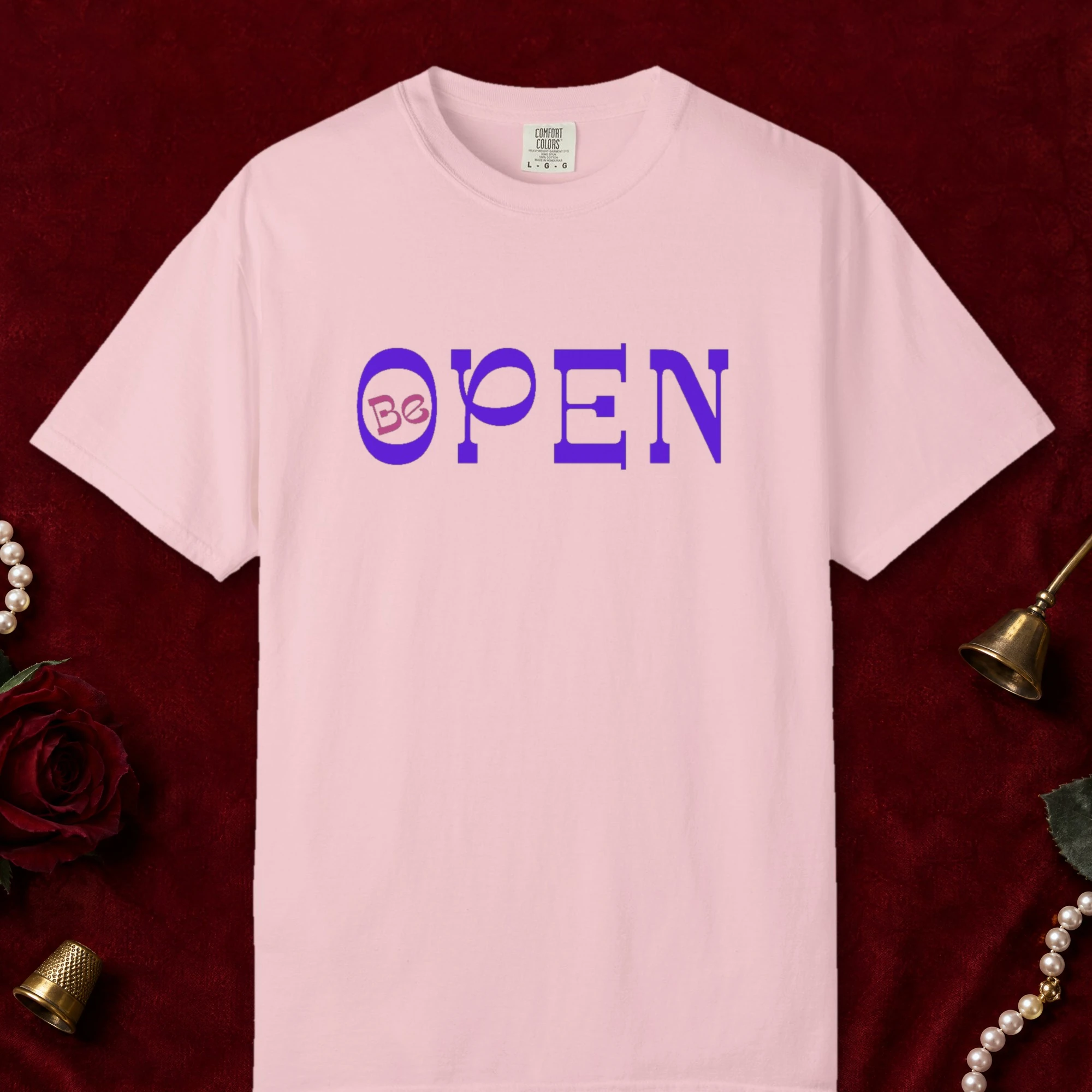 Open to Wonder design on a Blossom Comfort Colors 1717 tee, laid flat