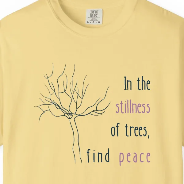 Close-up of the Peace in the Trees print on a Butter Comfort Colors 1717 tee