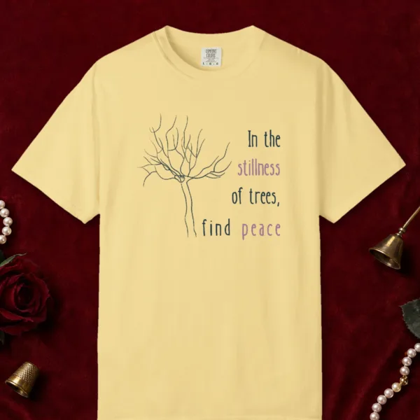 Peace in the Trees design on a Butter Comfort Colors 1717 tee, laid flat