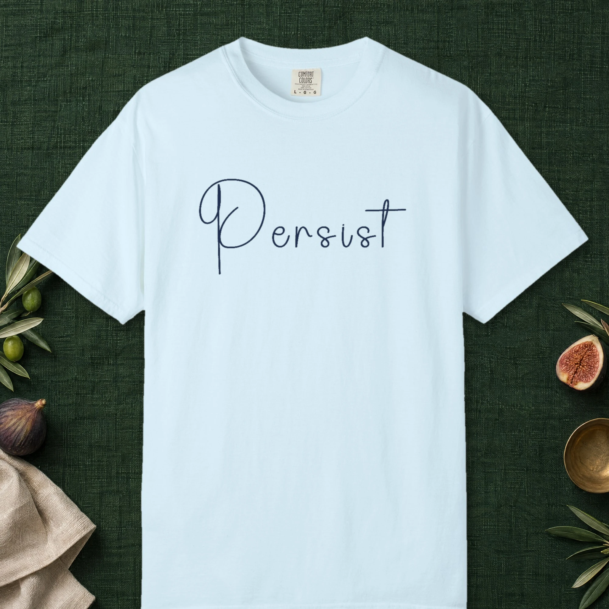 Persist design on a Chambray Comfort Colors 1717 tee, laid flat