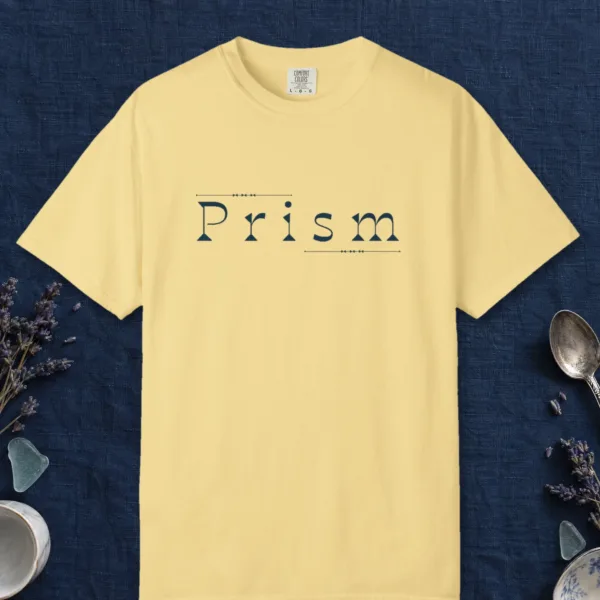 Prism Slab Serif design on a Butter Comfort Colors 1717 tee, laid flat
