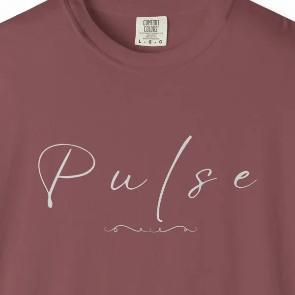 Close-up of the Pulse in Flowing Hand print on a Brick Comfort Colors 1717 tee