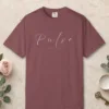 Pulse in Flowing Hand design on a Brick Comfort Colors 1717 tee, laid flat