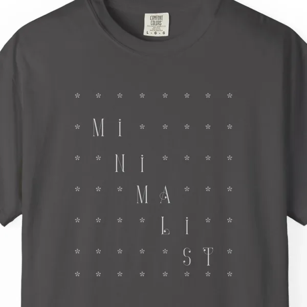 Close-up of the Quiet Grid print on a Graphite Comfort Colors 1717 tee