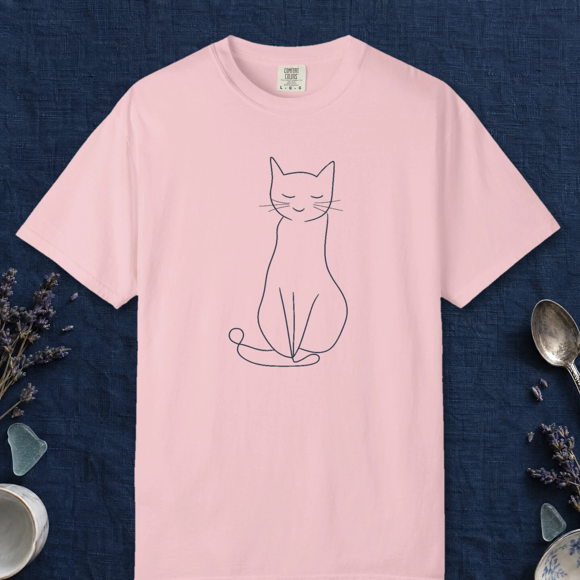 Quiet Line Cat design on a Blossom Comfort Colors 1717 tee, laid flat