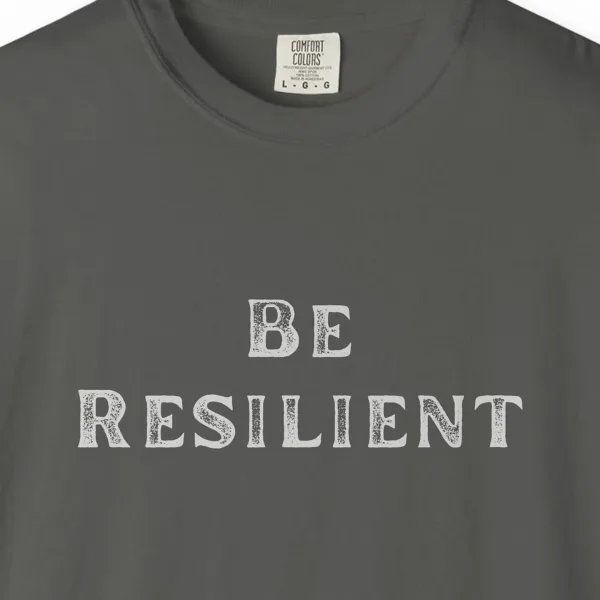 quiet-resilience-tee-pepper-chest Close-up of the Quiet Resilience print on a Pepper Comfort Colors 1717 tee