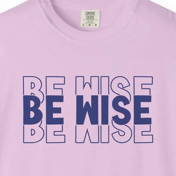 Close-up of the Quiet Wisdom print on a Orchid Comfort Colors 1717 tee