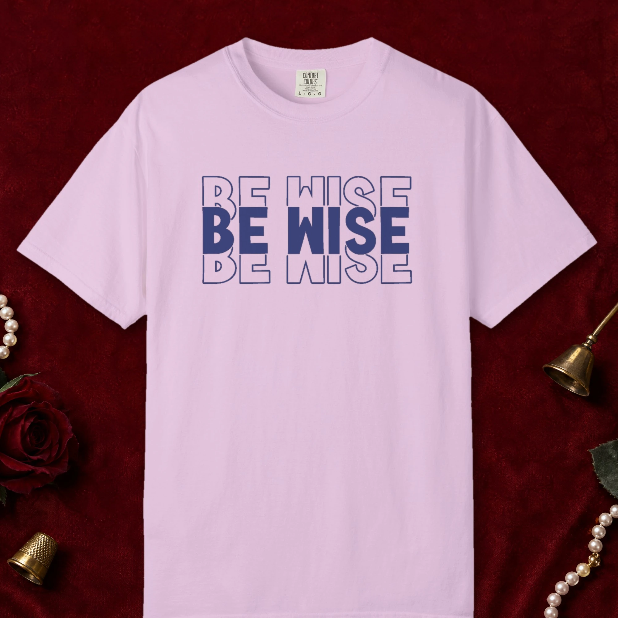 Quiet Wisdom design on a Orchid Comfort Colors 1717 tee, laid flat