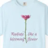 Close-up of the Radiate Like a Flower print on a Chambray Comfort Colors 1717 tee