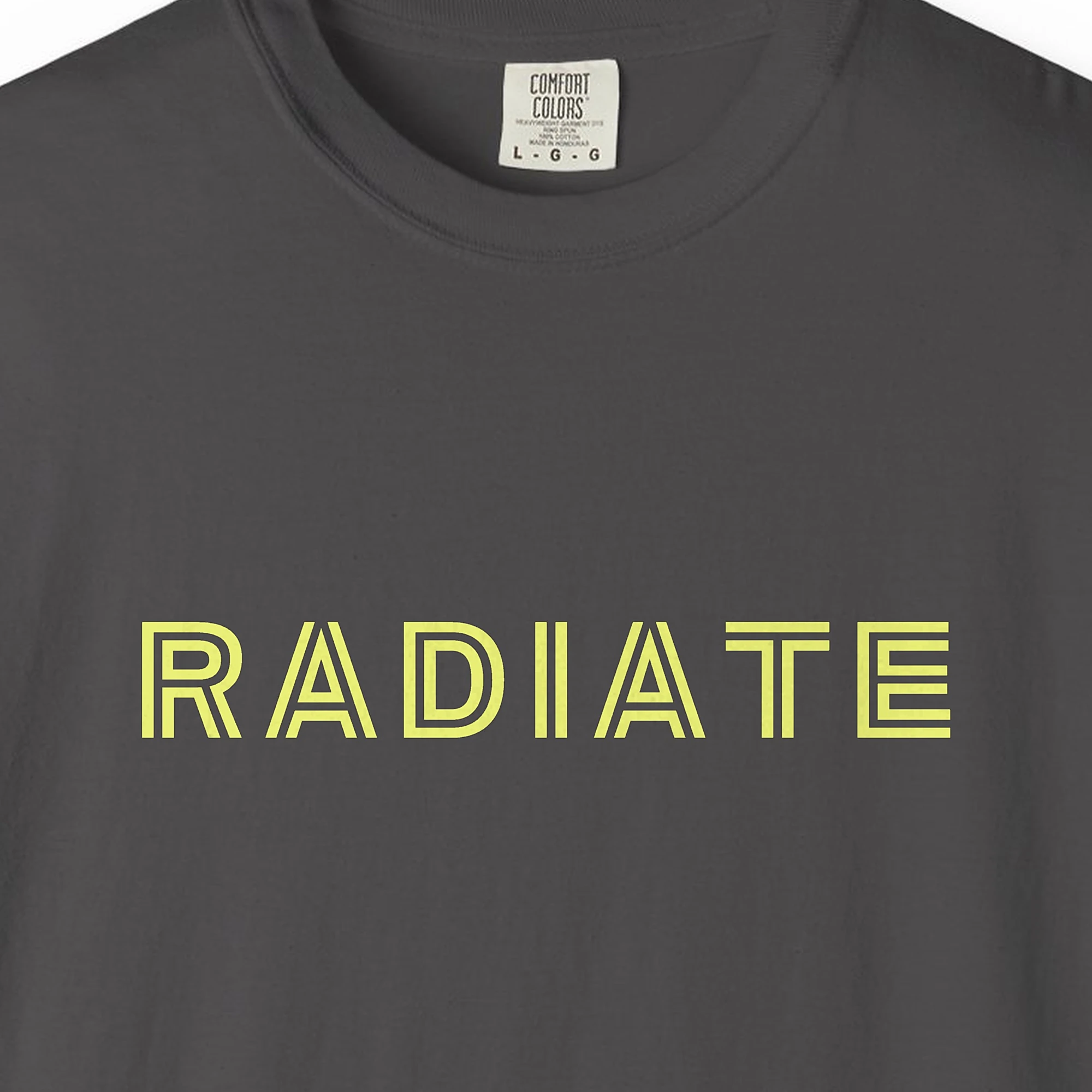 Close-up of the Radiate print on a Graphite Comfort Colors 1717 tee