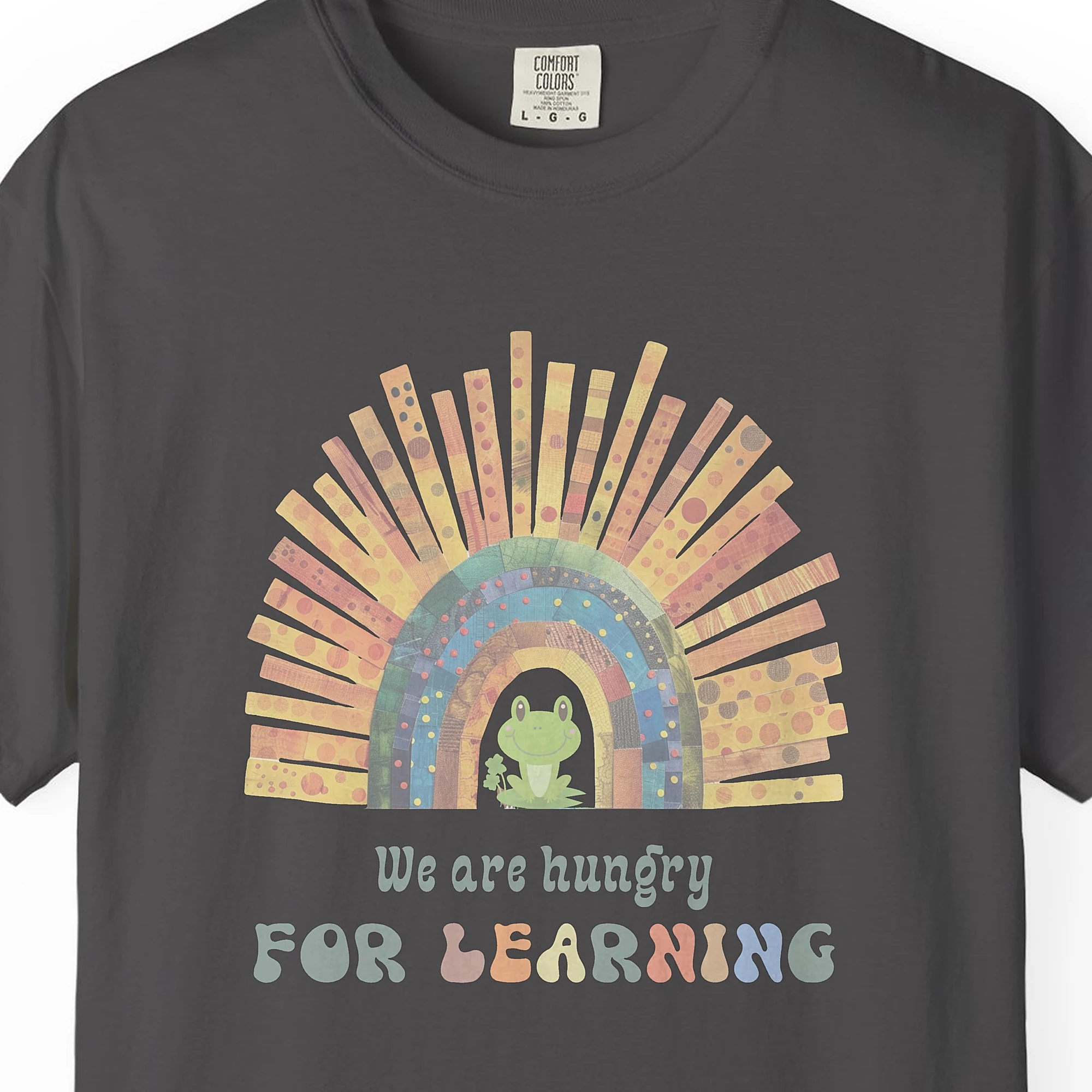 Close-up of the Rainbow Frog Learner print on a Graphite Comfort Colors 1717 tee