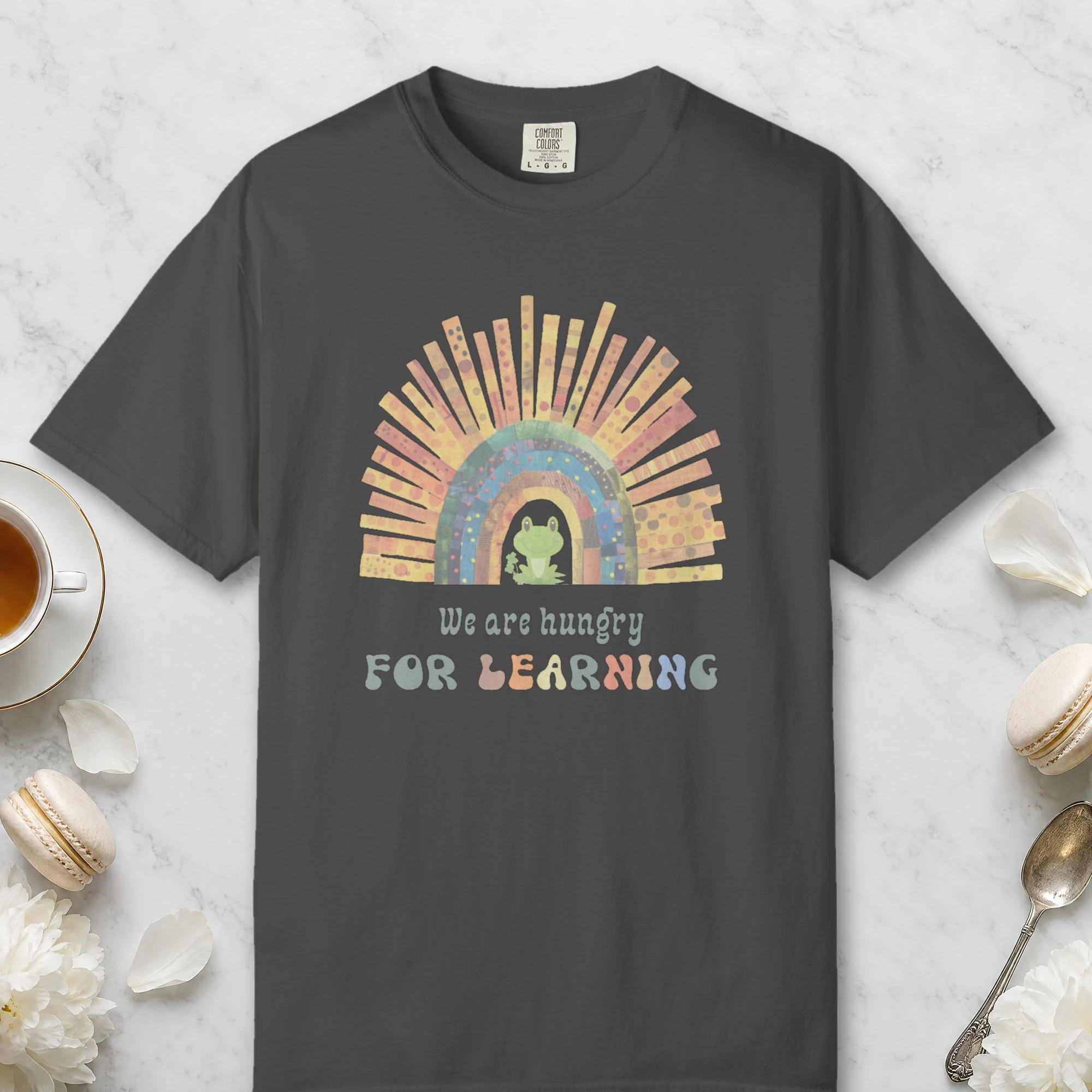 Rainbow Frog Learner design on a Graphite Comfort Colors 1717 tee, laid flat