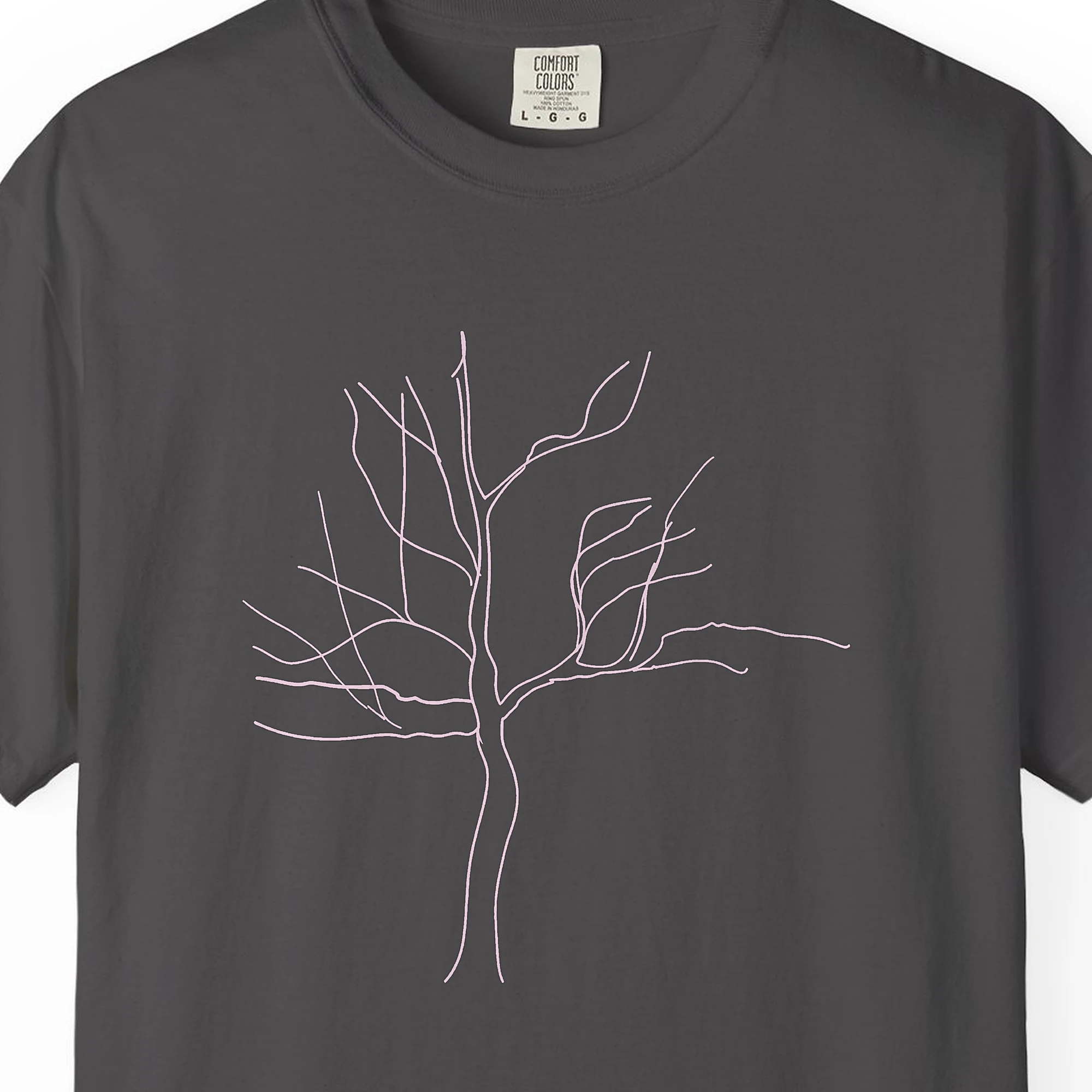 reaching-branches-tee-graphite-chest Close-up of the Reaching Branches print on a Graphite Comfort Colors 1717 tee