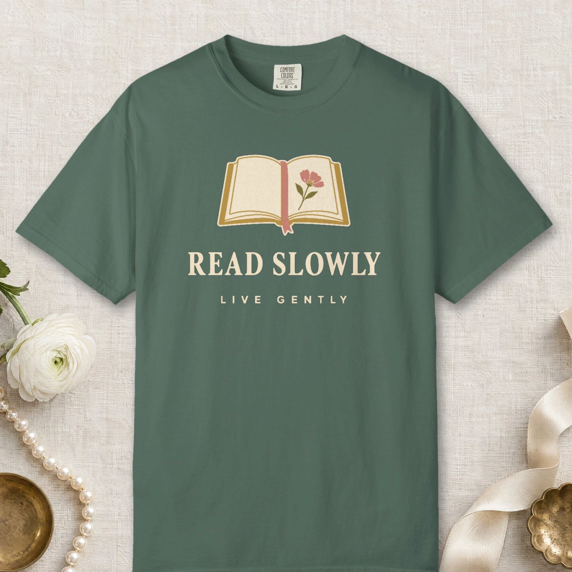 Read Slowly Live Gently design on a Blue Spruce Comfort Colors 1717 tee, laid flat
