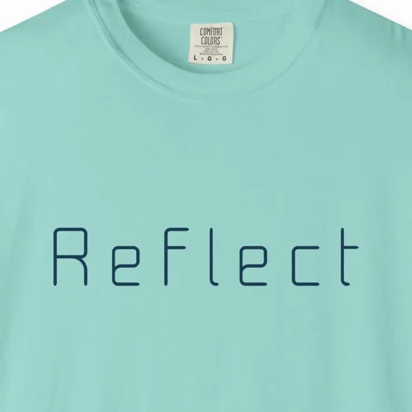 Close-up of the Reflect Square Letter print on a Chalky Mint Comfort Colors 1717 tee