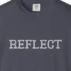 Close-up of the Reflect print on a Navy Comfort Colors 1717 tee