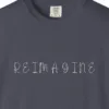 reimagine-handwritten-capitals-tee-navy-chest Close-up of the Reimagine Handwritten Capitals print on a Navy Comfort Colors 1717 tee